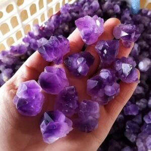 Amethyst Small Clusters in Hand